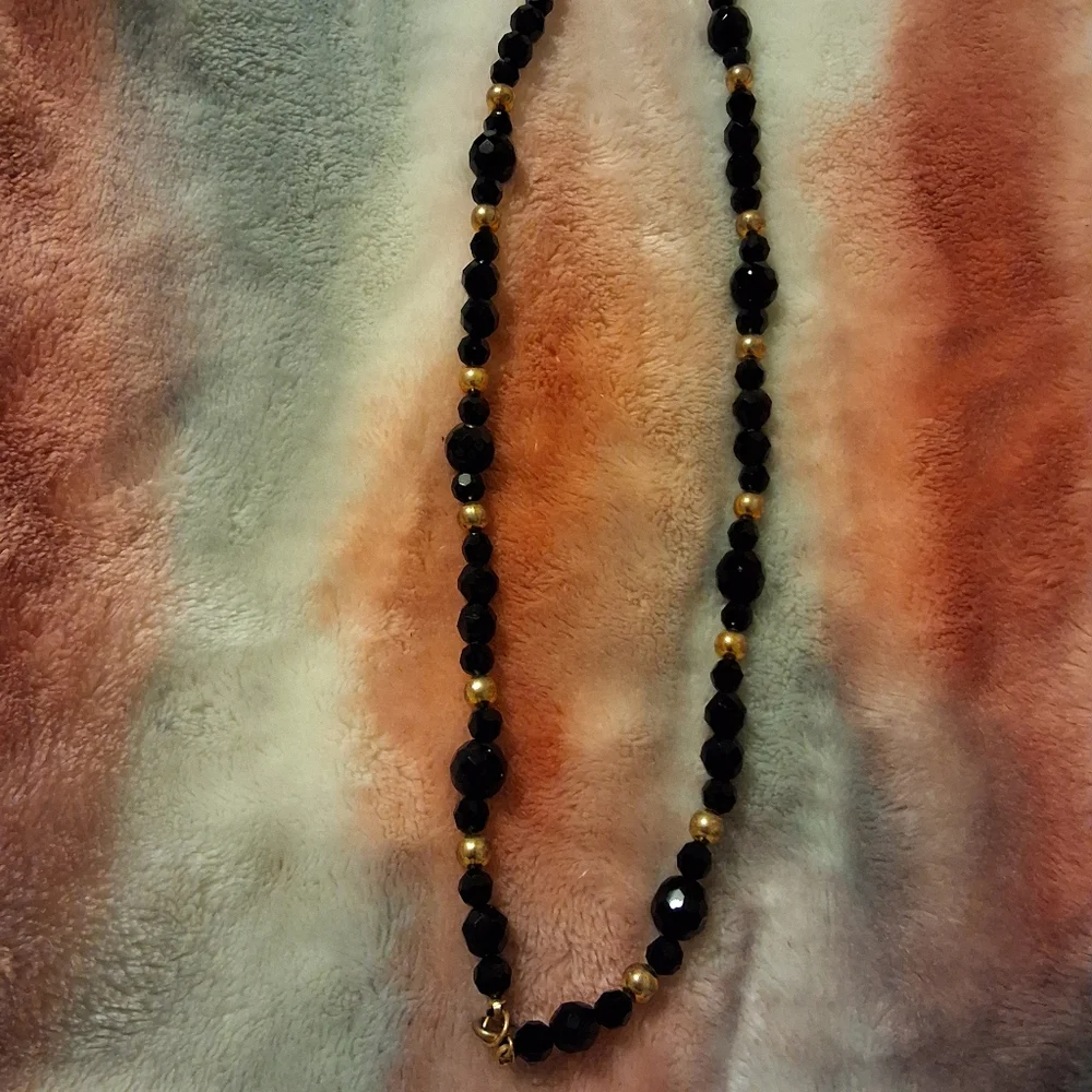 NWOT Black necklace with gold beads